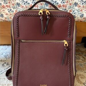 Calpak Maroon Backpack with Gold Hardware (retired color)